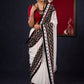 Exclusive Georgette saree with Ajrakh borders & Intricate Hand Embroidered highlights