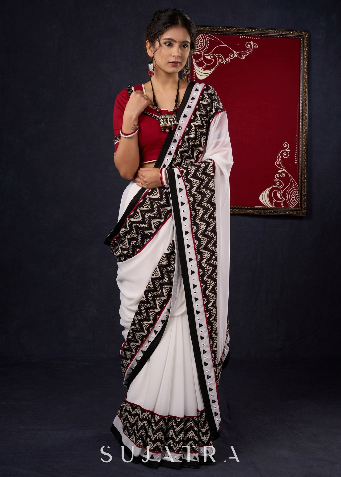 Exclusive Georgette saree with Ajrakh borders & Intricate Hand Embroidered highlights