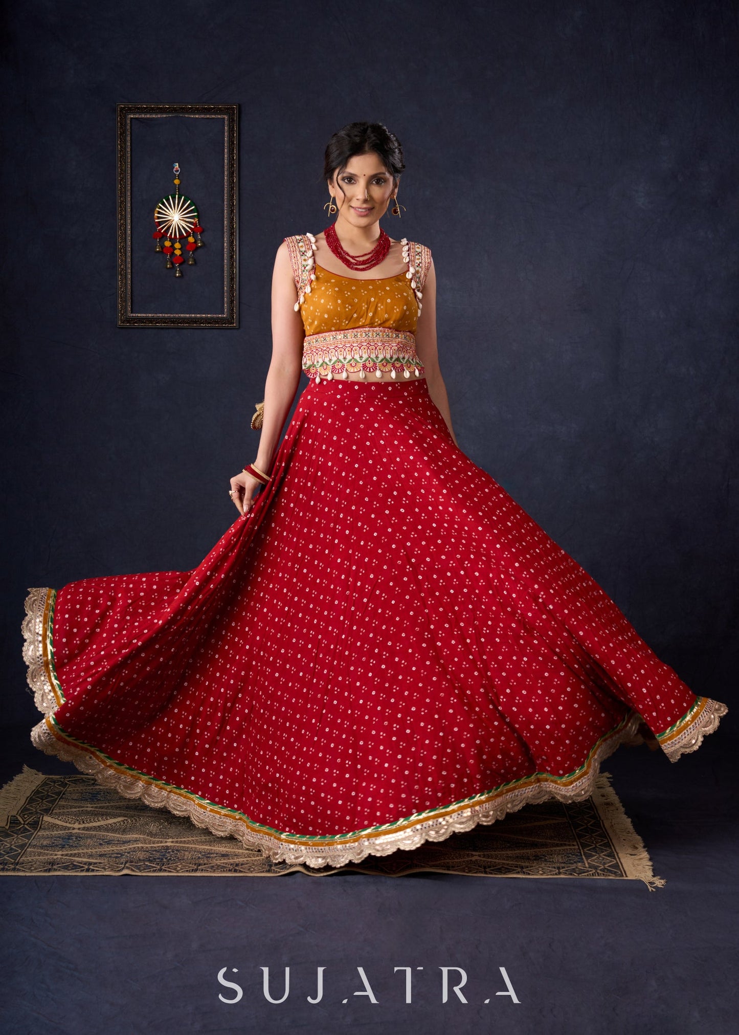 Beautiful Red Bandhani Lehenga With Mustard Embroidered Blouse & Matching Dupatta.