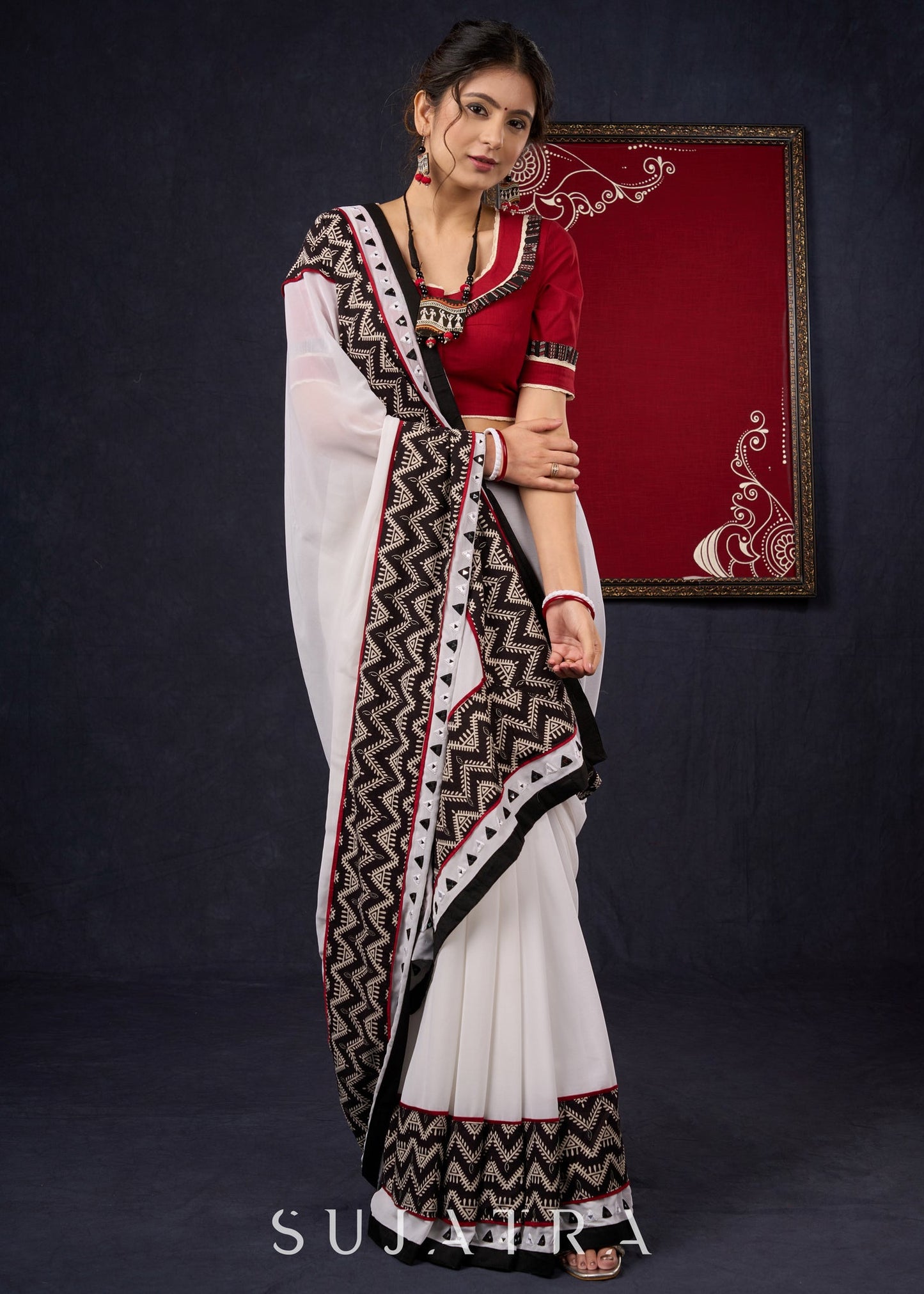 Exclusive Georgette saree with Ajrakh borders & Intricate Hand Embroidered highlights