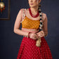 Beautiful Red Bandhani Lehenga With Mustard Embroidered Blouse & Matching Dupatta.