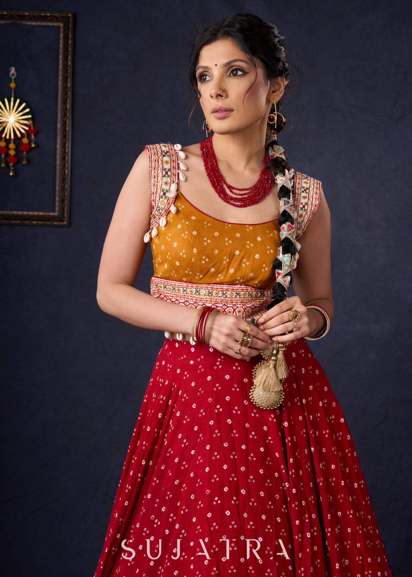 Beautiful Red Bandhani Lehenga With Mustard Embroidered Blouse & Matching Dupatta.