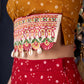 Beautiful Red Bandhani Lehenga With Mustard Embroidered Blouse & Matching Dupatta.