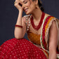 Beautiful Red Bandhani Lehenga With Mustard Embroidered Blouse & Matching Dupatta.