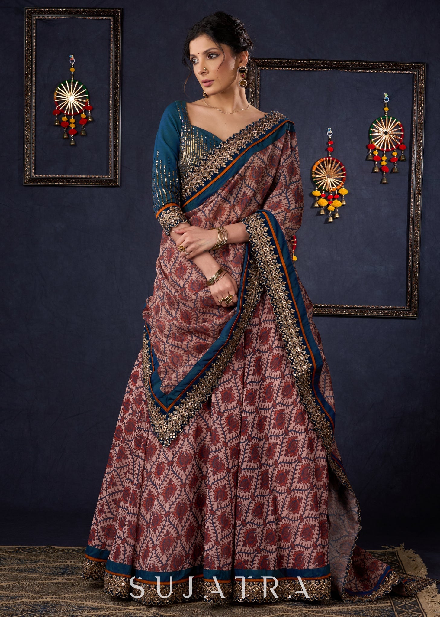 Graceful Printed Lehenga With Gold Embroidered Blouse & Matching Dupatta.