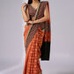 Exclusive orange cotton saree with multi Ajrakh border