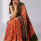 Exclusive orange cotton saree with multi Ajrakh border