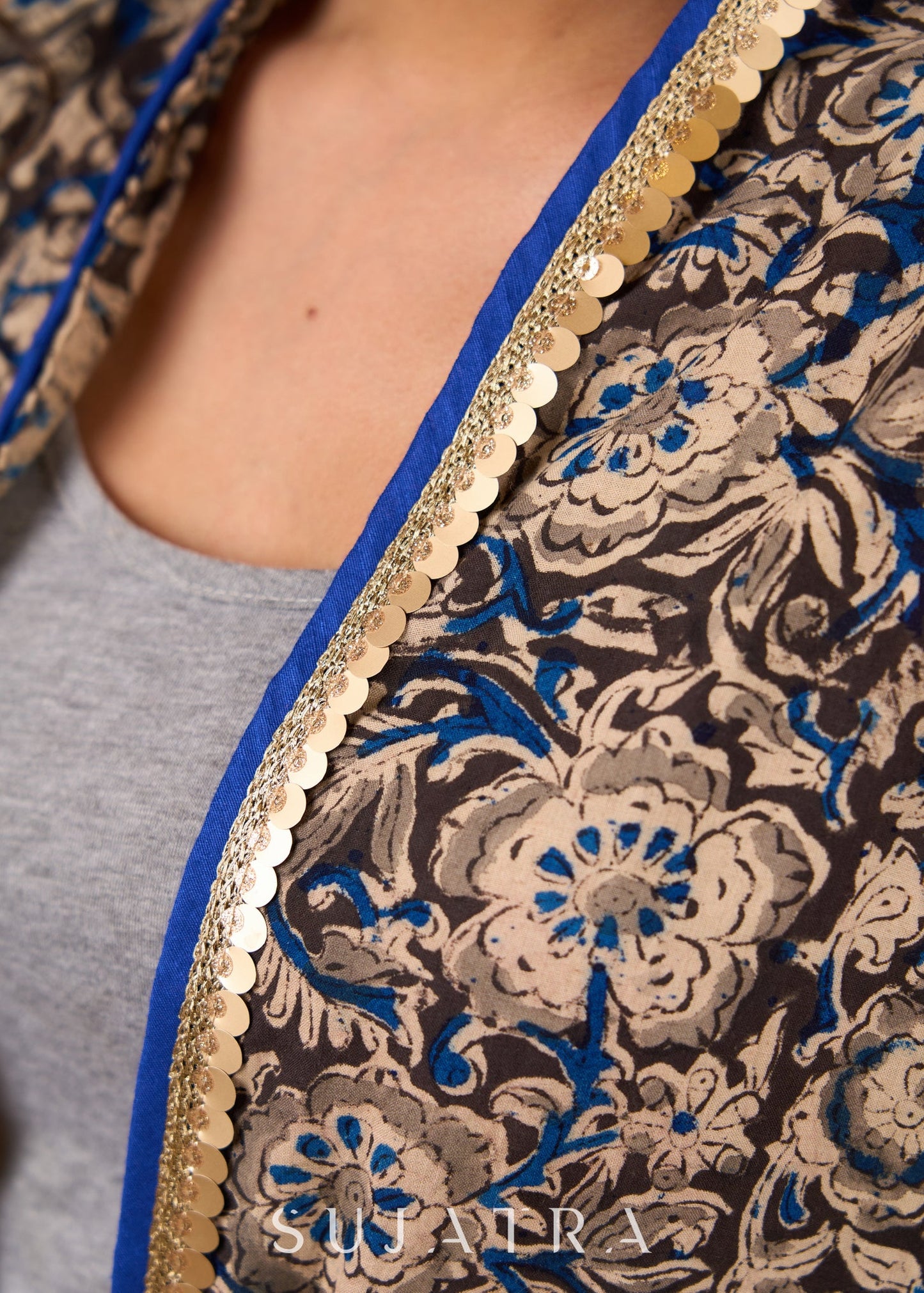 Flowy Grey Kalamkari Floral Asymmetrical Shrug With Delicate Golden Touch For Free Spirited Style