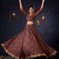 Beautiful Orange Printed Lehenga & Blouse With Mirror Work & Contrast Dupatta.