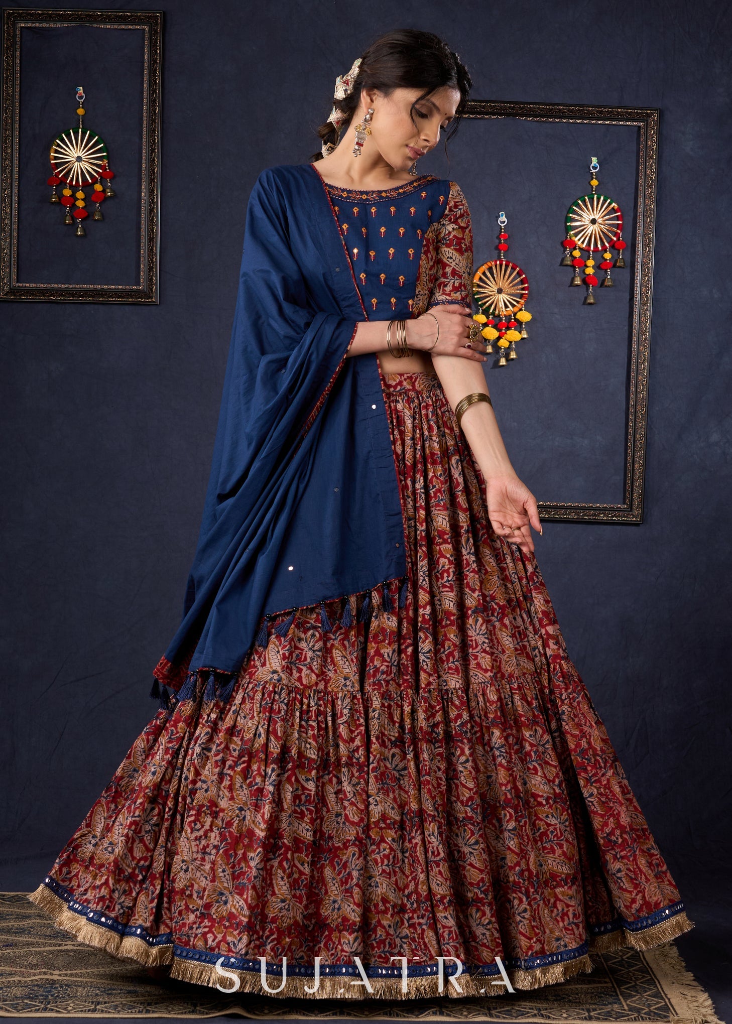 Evergreen Kalamkari Lehenga With Navy Blue Embroidered Blouse & Matching Dupatta.