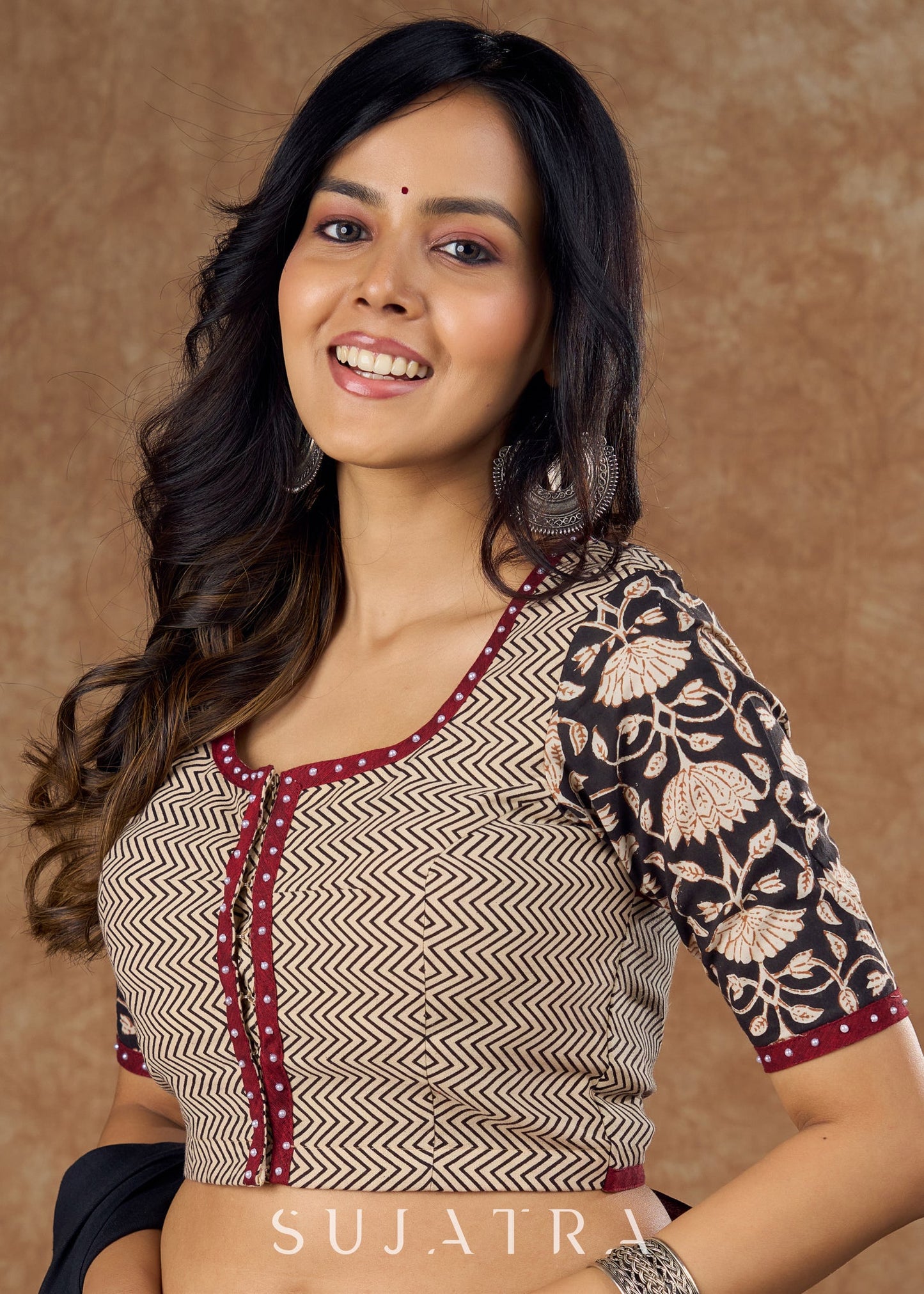 Classic cotton Ajrakh blouse with a blend of print , pattern and maroon detailing