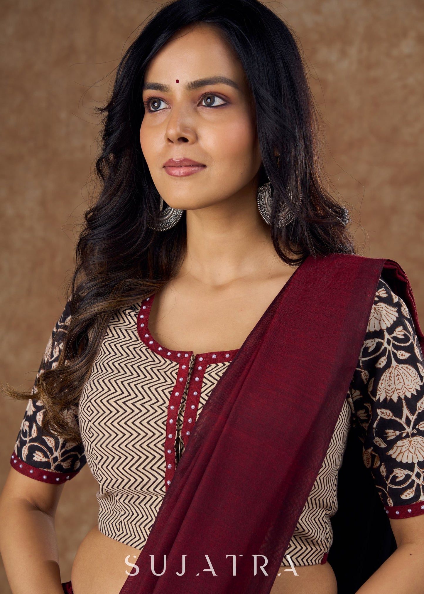 Classic cotton Ajrakh blouse with a blend of print , pattern and maroon detailing