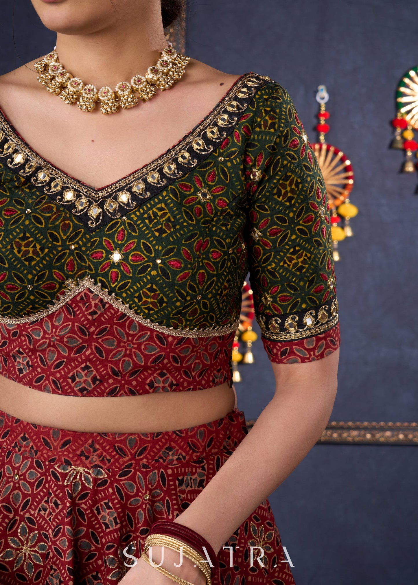 Green & Maroon Ajrakh Mix & Match Lehenga With All Over Embroidery & Contrast Dupatta.