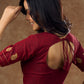 Real elegance : Maroon cotton blouse featuring intricate phaisley embroidery perfect for making a sophisticated statement