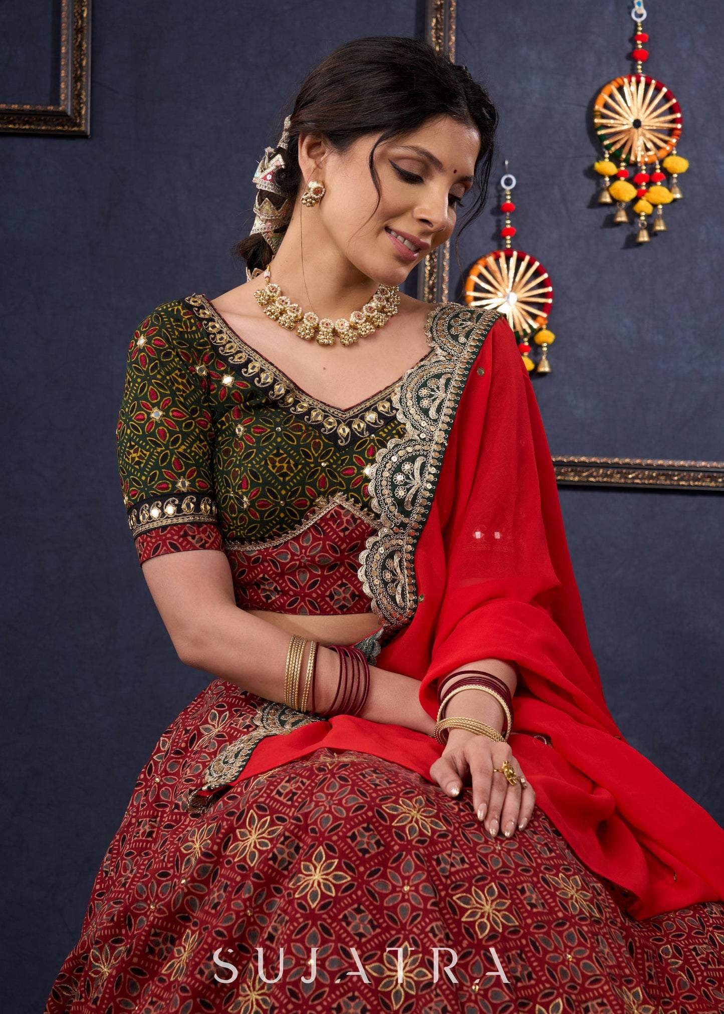 Green & Maroon Ajrakh Mix & Match Lehenga With All Over Embroidery & Contrast Dupatta.