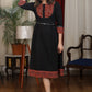 Black cotton flared dress with ajrakh combination highlighted with mirror lace