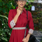 Graceful maroon cotton collared dress with floral combination & belt