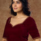 Rich maroon velvet  blouse with subtle embroidery & gold detailing on sleeves