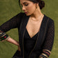 Evening Allure : Black Chikankari Long Shrug With The Sprinkle Of Red & Green Unique Embellishments