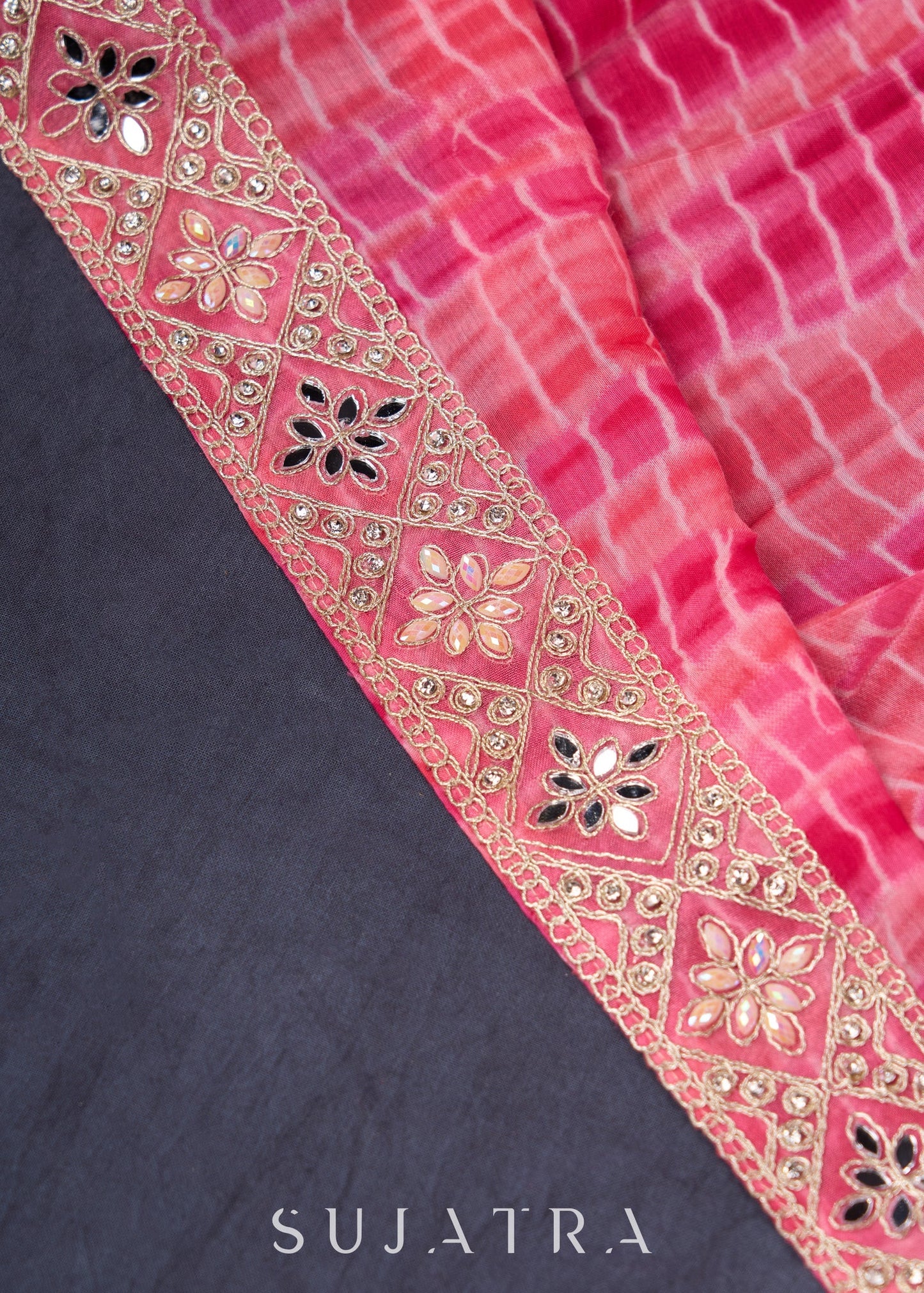 Pretty Pink Shibori Lehenga With Stone Embellishments On The Blouse & Matching Dupatta.