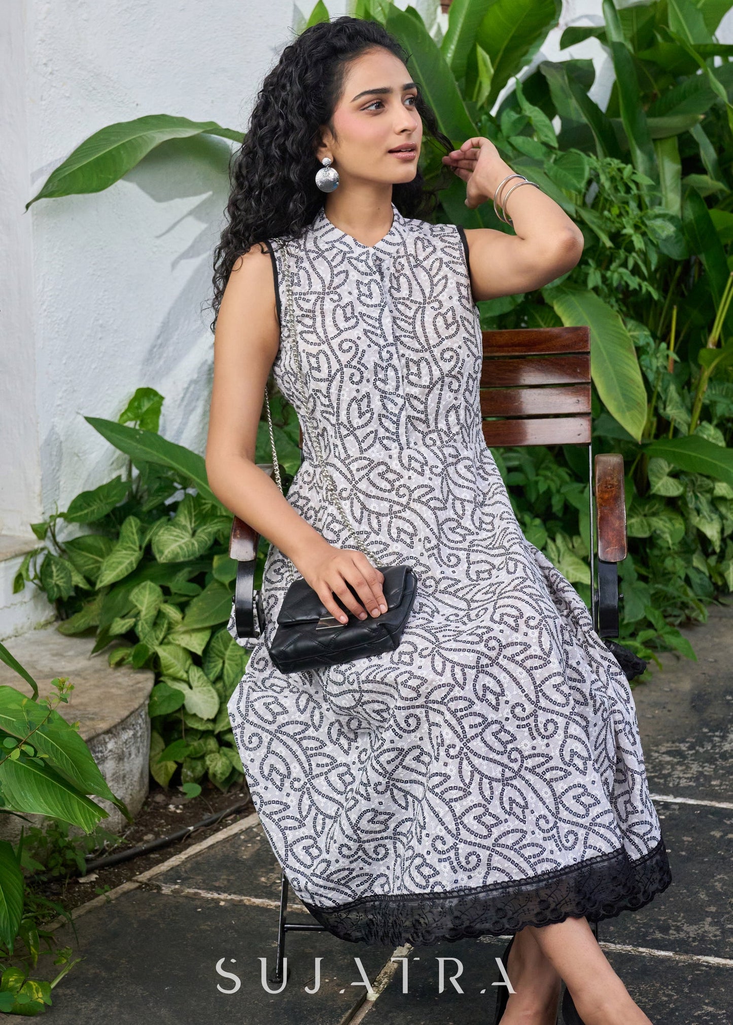 Classy black & white self embroidered printed sleeveless dress