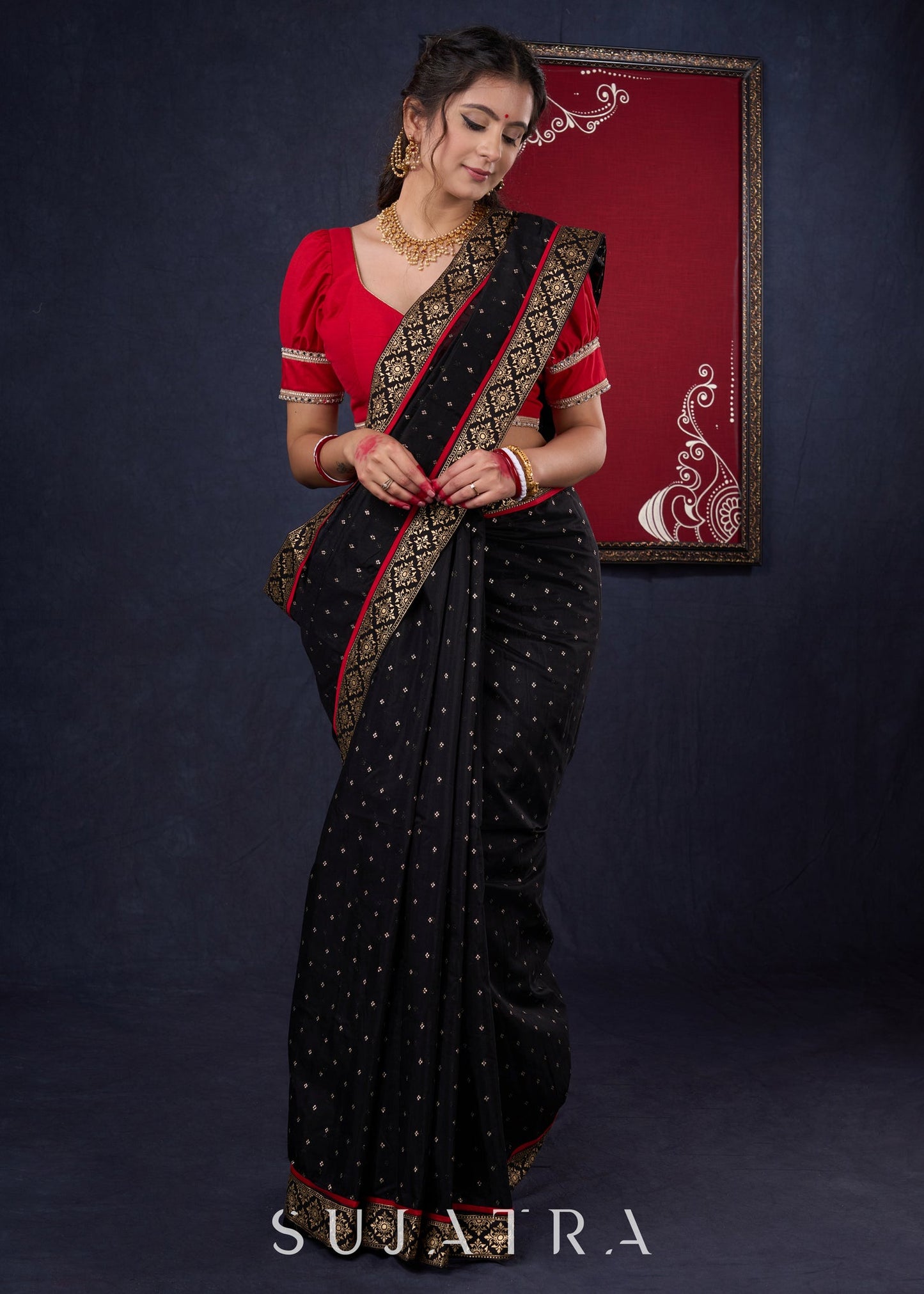 Classy Black Chanderi saree with overall Gold Butta, Golden border & Red Detailing