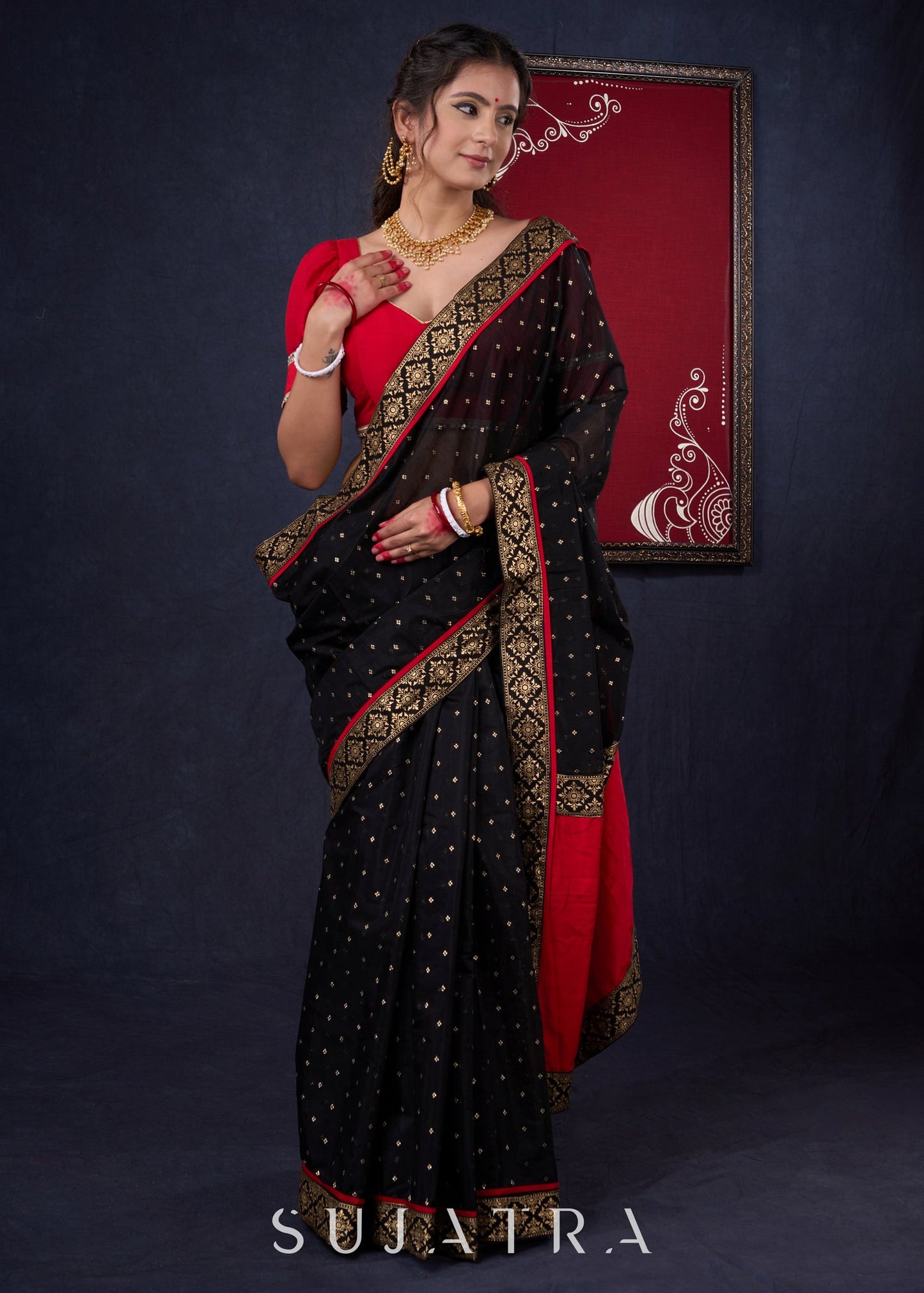 Classy Black Chanderi saree with overall Gold Butta, Golden border & Red Detailing