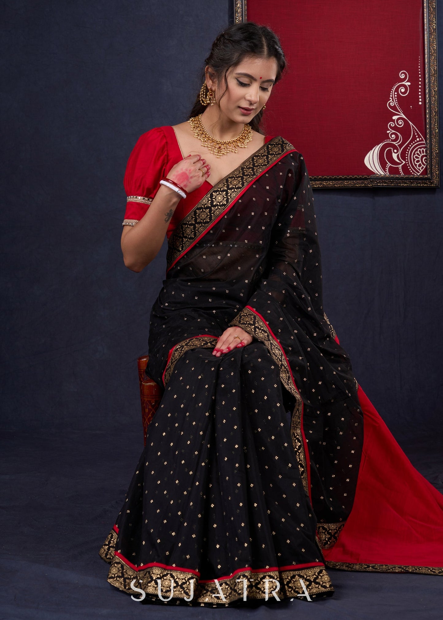 Classy Black Chanderi saree with overall Gold Butta, Golden border & Red Detailing