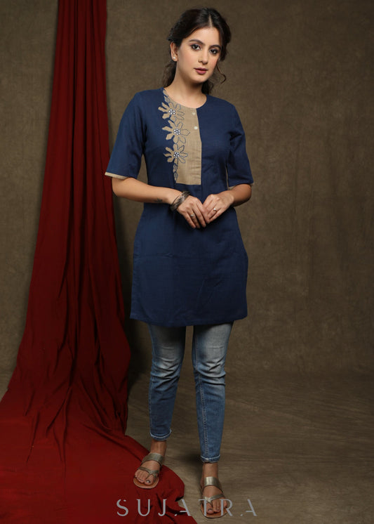 Navy blue cotton tunic with beige floral cutwork design.