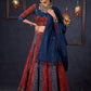 Maroon & Blue Ajrakh Lehenga With Mirror Work On The Blouse & Matching Dupatta.