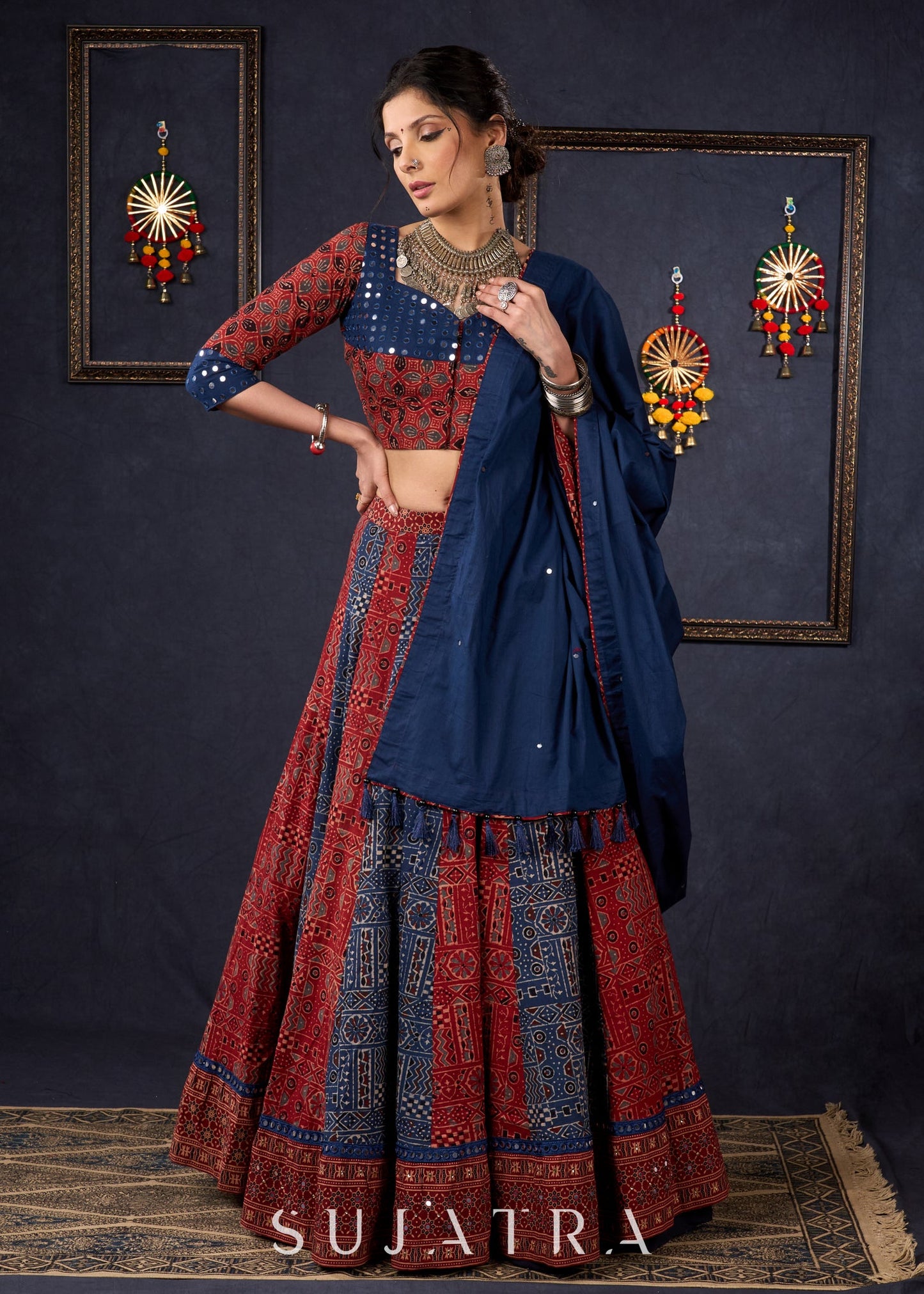 Maroon & Blue Ajrakh Lehenga With Mirror Work On The Blouse & Matching Dupatta.