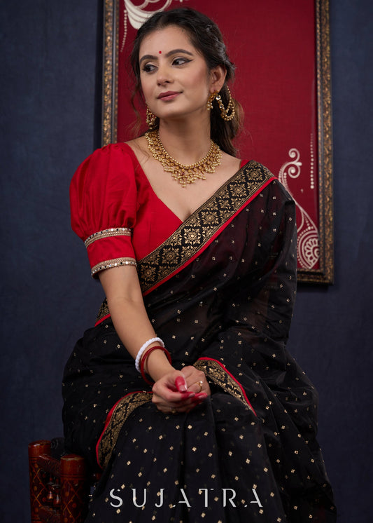 Classy Black Chanderi saree with overall Gold Butta, Golden border & Red Detailing