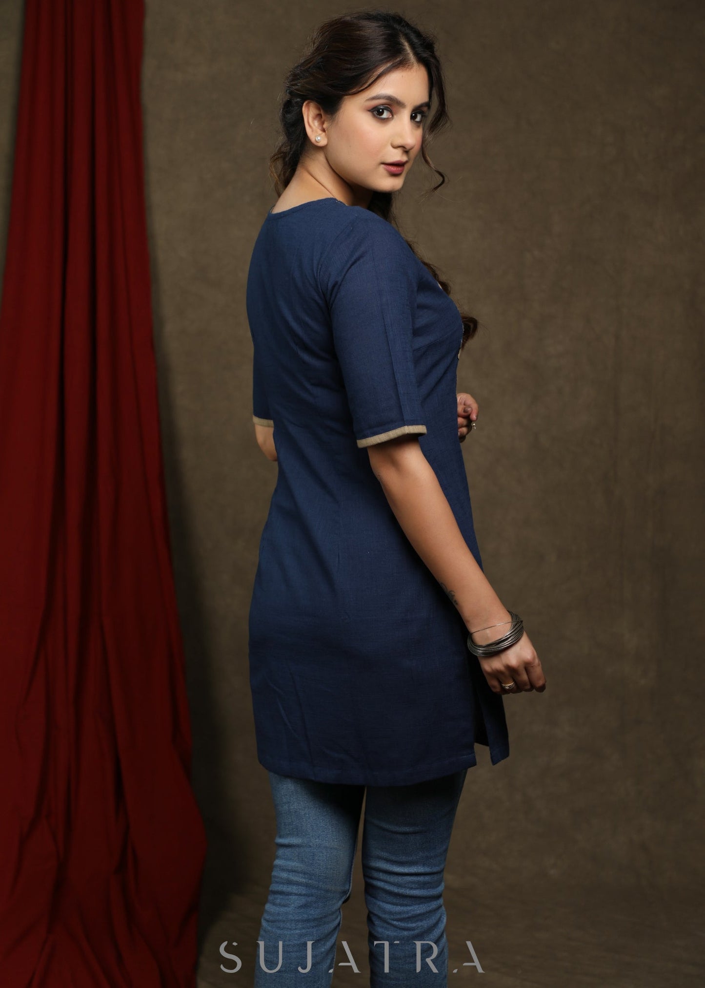 Navy blue cotton tunic with beige floral cutwork design.