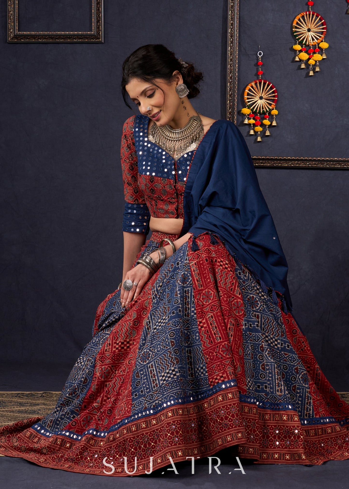 Maroon & Blue Ajrakh Lehenga With Mirror Work On The Blouse & Matching Dupatta.