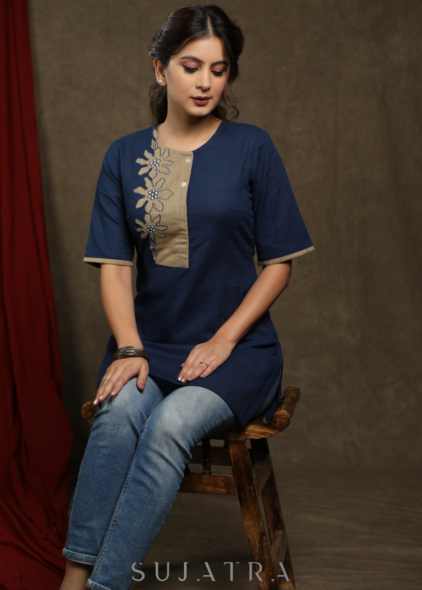 Navy blue cotton tunic with beige floral cutwork design.