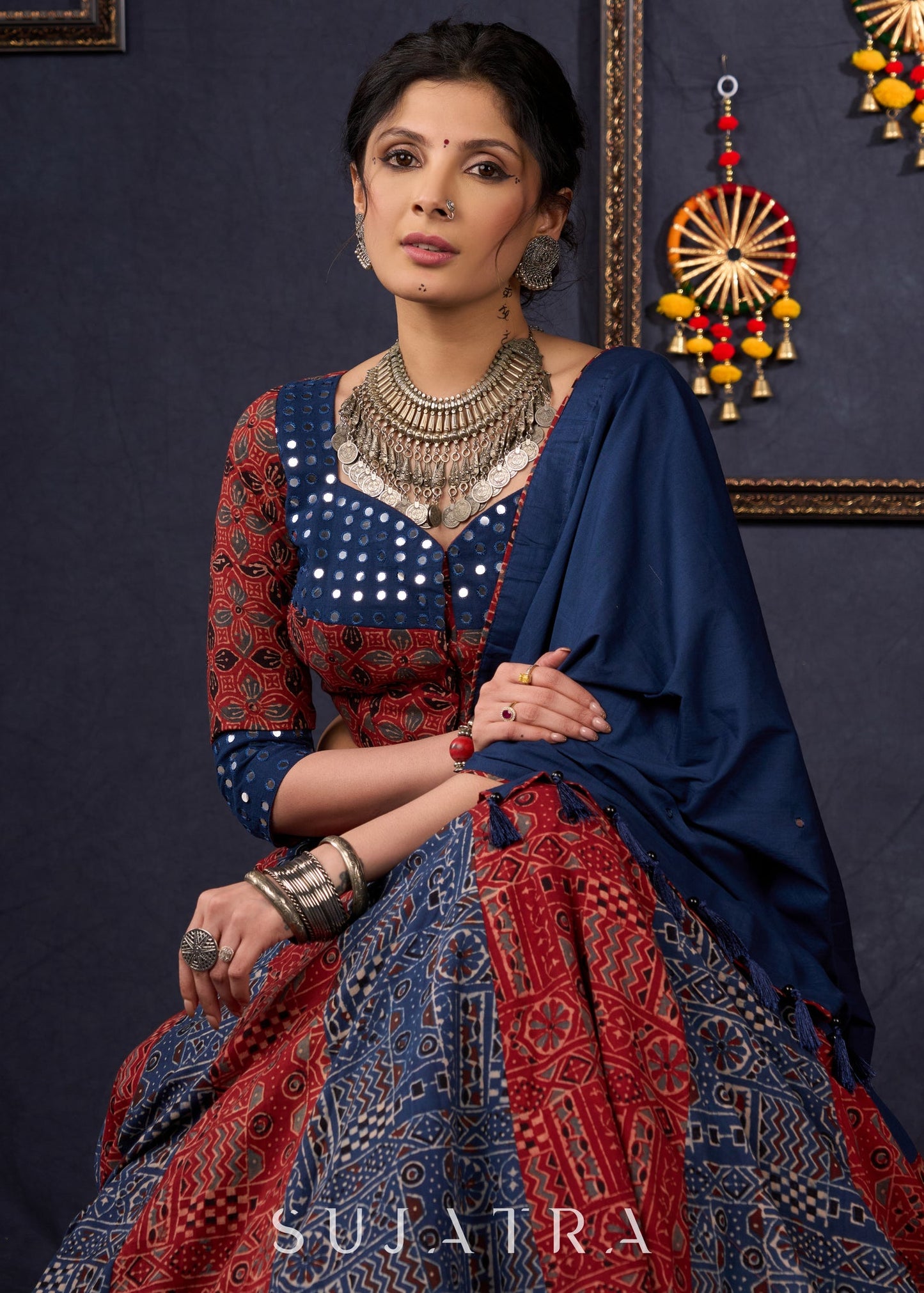 Maroon & Blue Ajrakh Lehenga With Mirror Work On The Blouse & Matching Dupatta.