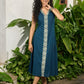 Classy teal cotton sleeveless dress highlighted with intricate embroidery