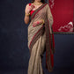 Lustrous Chanderi Grey Saree with Self Gold Checks Highlighted with Ajrakh Border & Palu with Maroon Detailing