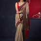 Lustrous Chanderi Grey Saree with Self Gold Checks Highlighted with Ajrakh Border & Palu with Maroon Detailing