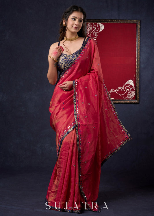 Mesmerizing Tissue Saree with all-over mirror work detailing highlighted with Banaseri Border