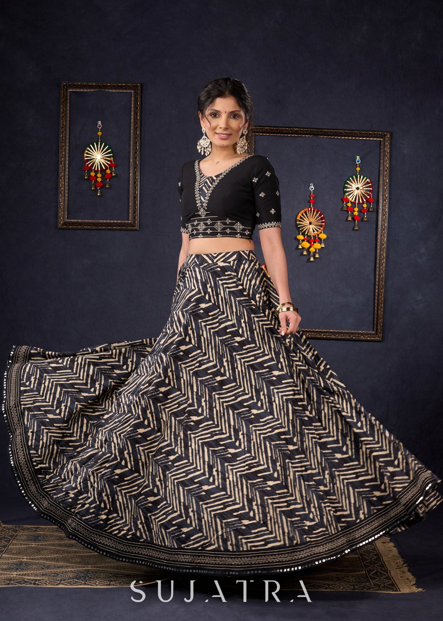 Elegant Black Printed Lehenga With Embroidered Blouse & Net Dupatta.