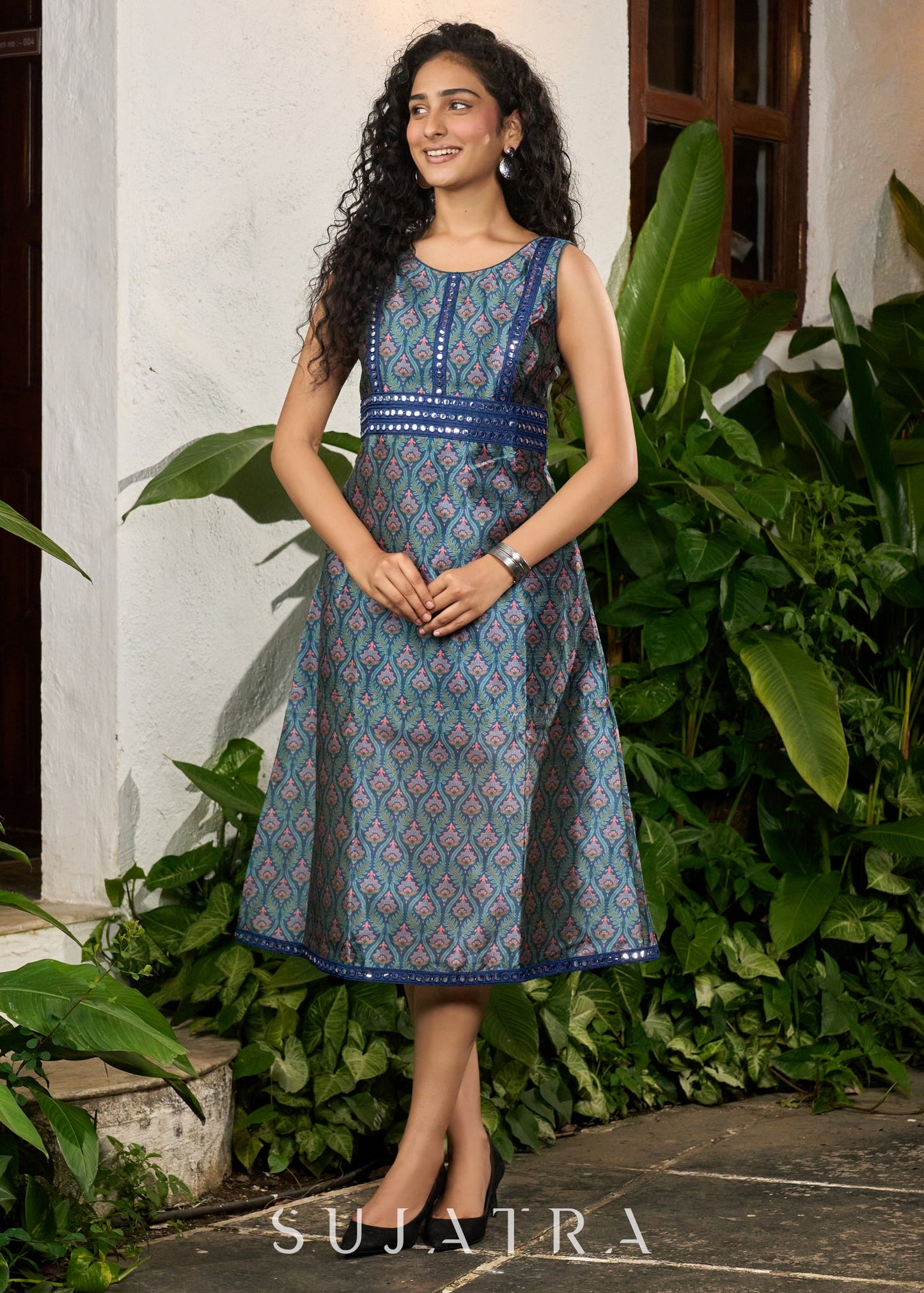 Stylish navy blue sleeveless floral dress highlighted with mirrorwork lace