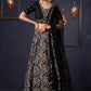 Elegant Black Printed Lehenga With Embroidered Blouse & Net Dupatta.