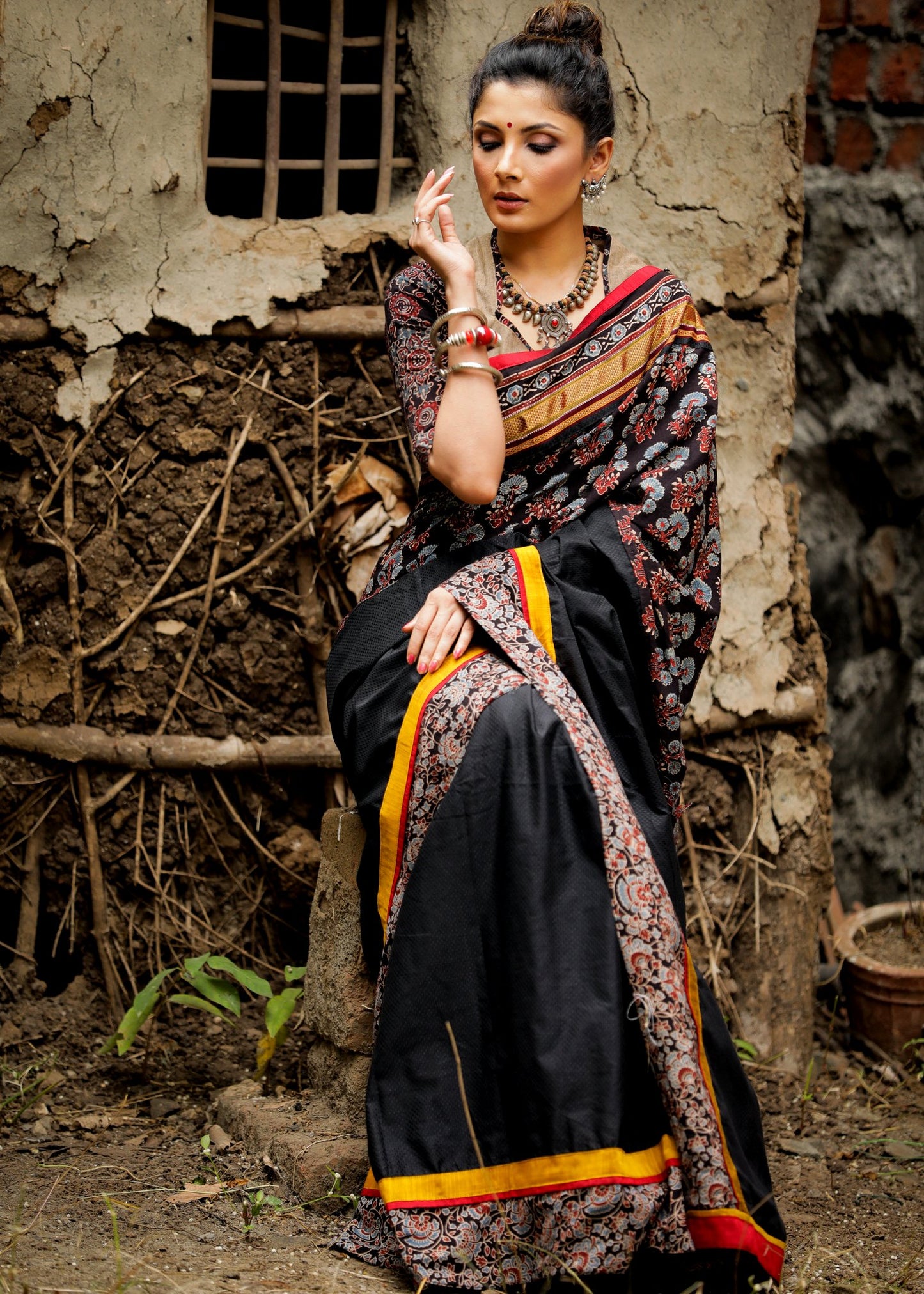 Exclusive black khun saree with block printed Ajrakh combination