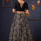 Elegant Black Printed Lehenga With Embroidered Blouse & Net Dupatta.