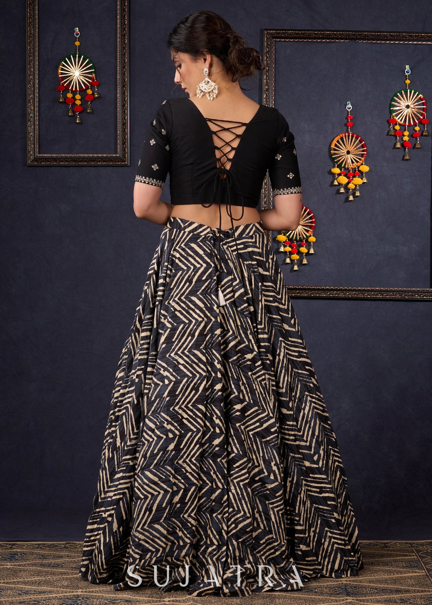 Elegant Black Printed Lehenga With Embroidered Blouse & Net Dupatta.