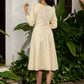 Subtle light yellow cotton dress highlighted with beautiful embroidered lace