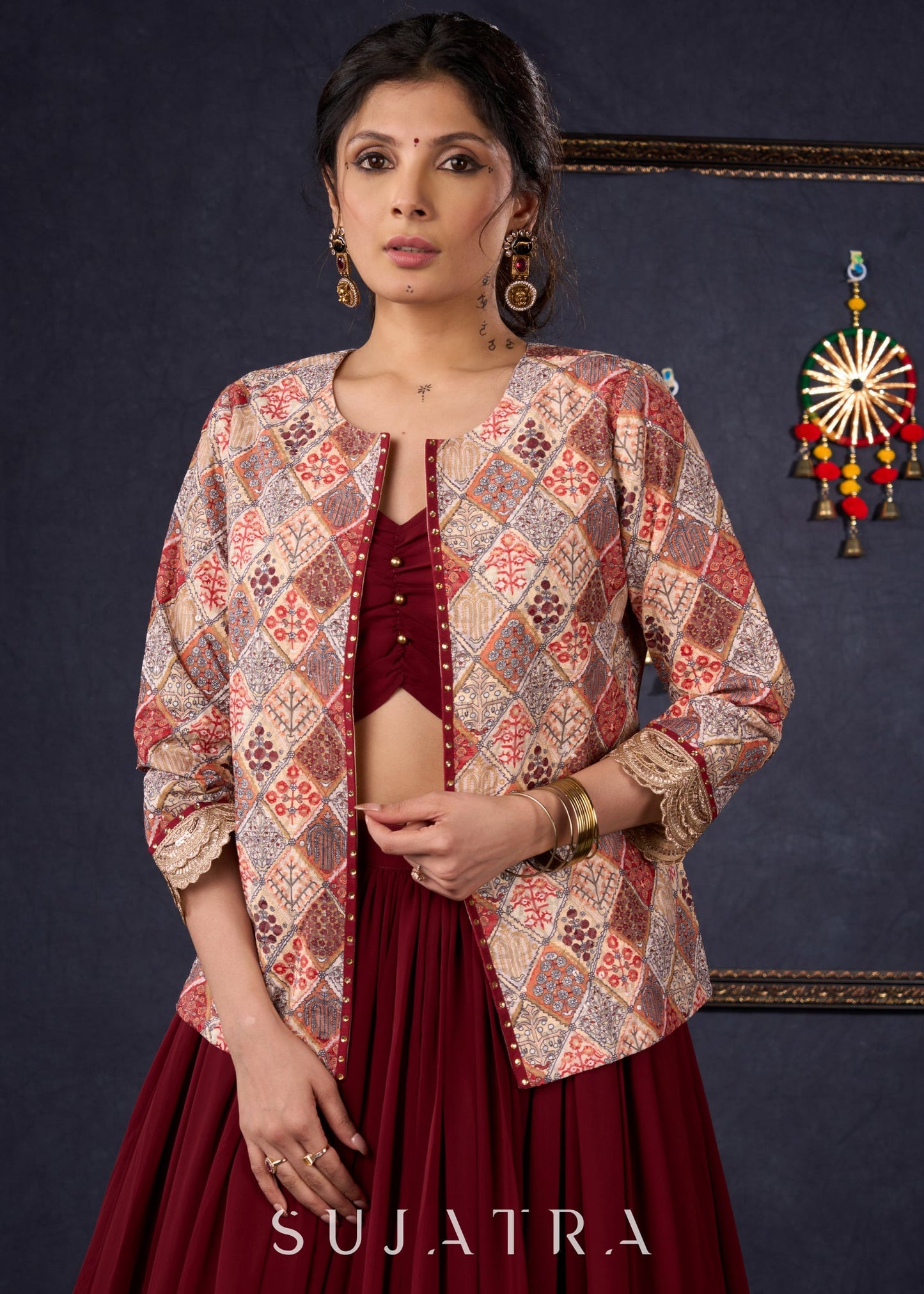 Classic Maroon Georgette Lehenga With Matching Blouse & Self-Embroidered Jacket .