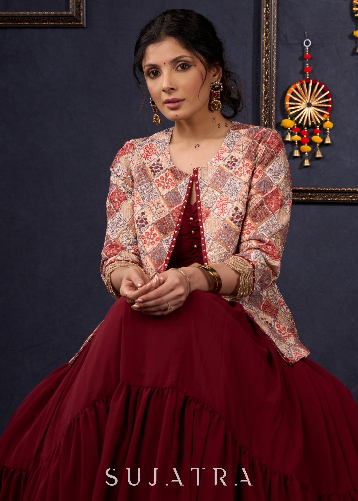 Classic Maroon Georgette Lehenga With Matching Blouse & Self-Embroidered Jacket .