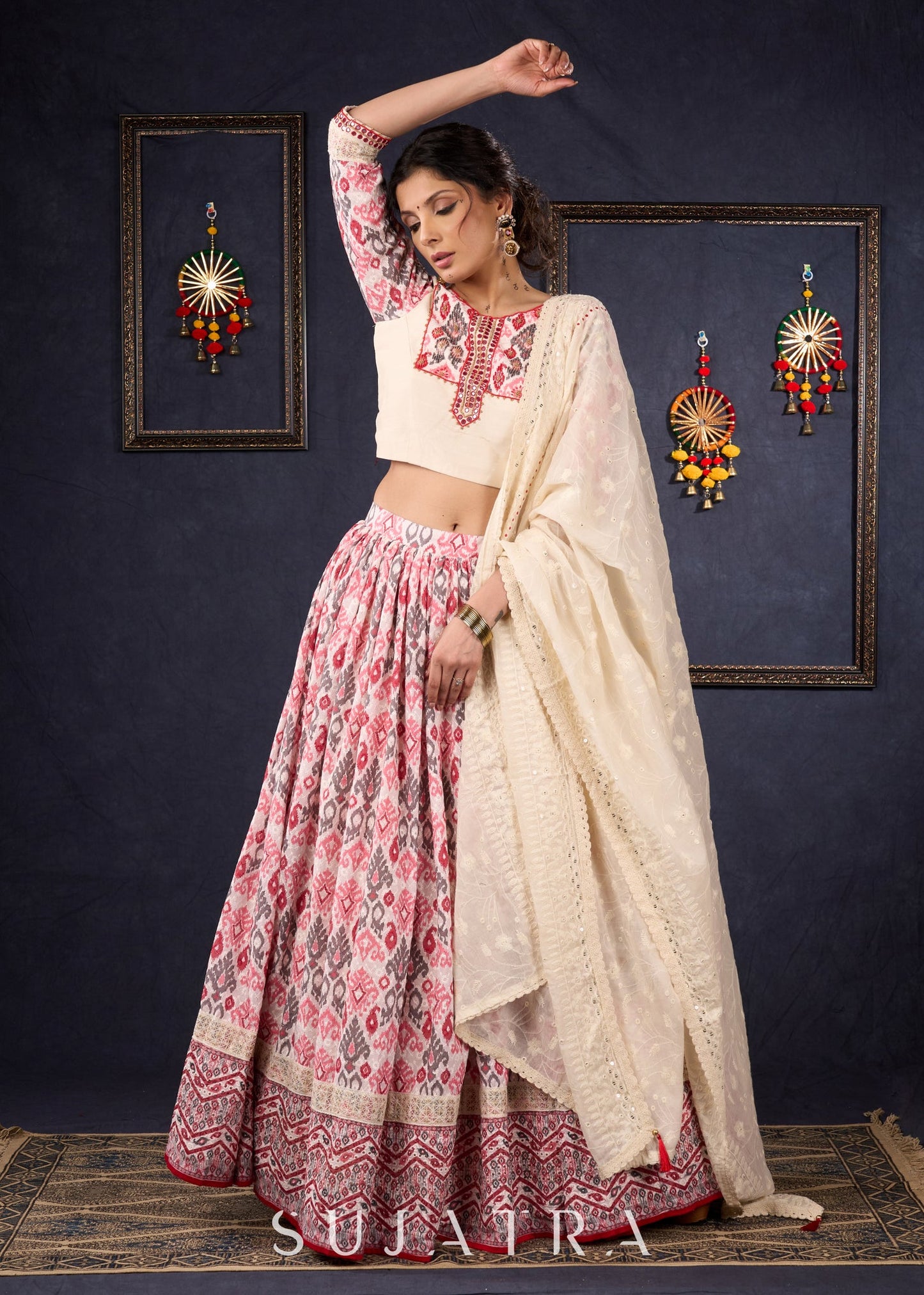 Elegant Off-White & Red Ikat Print Lehenga With Matching Blouse & Dupatta.